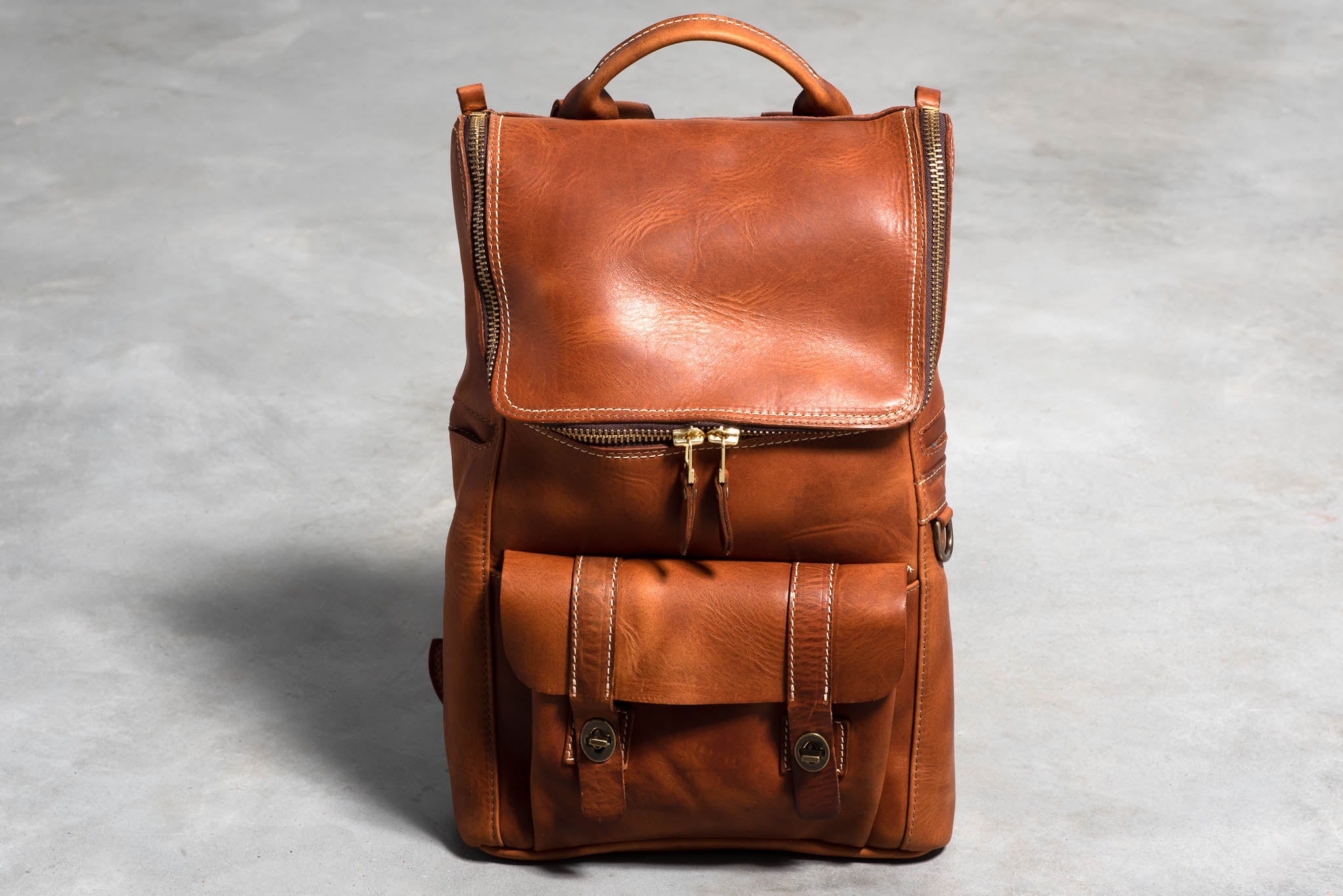 Zip top leather backpack hotsell