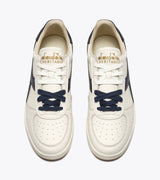 B. ELITE Dominio | White/Peacoat | DIADORA